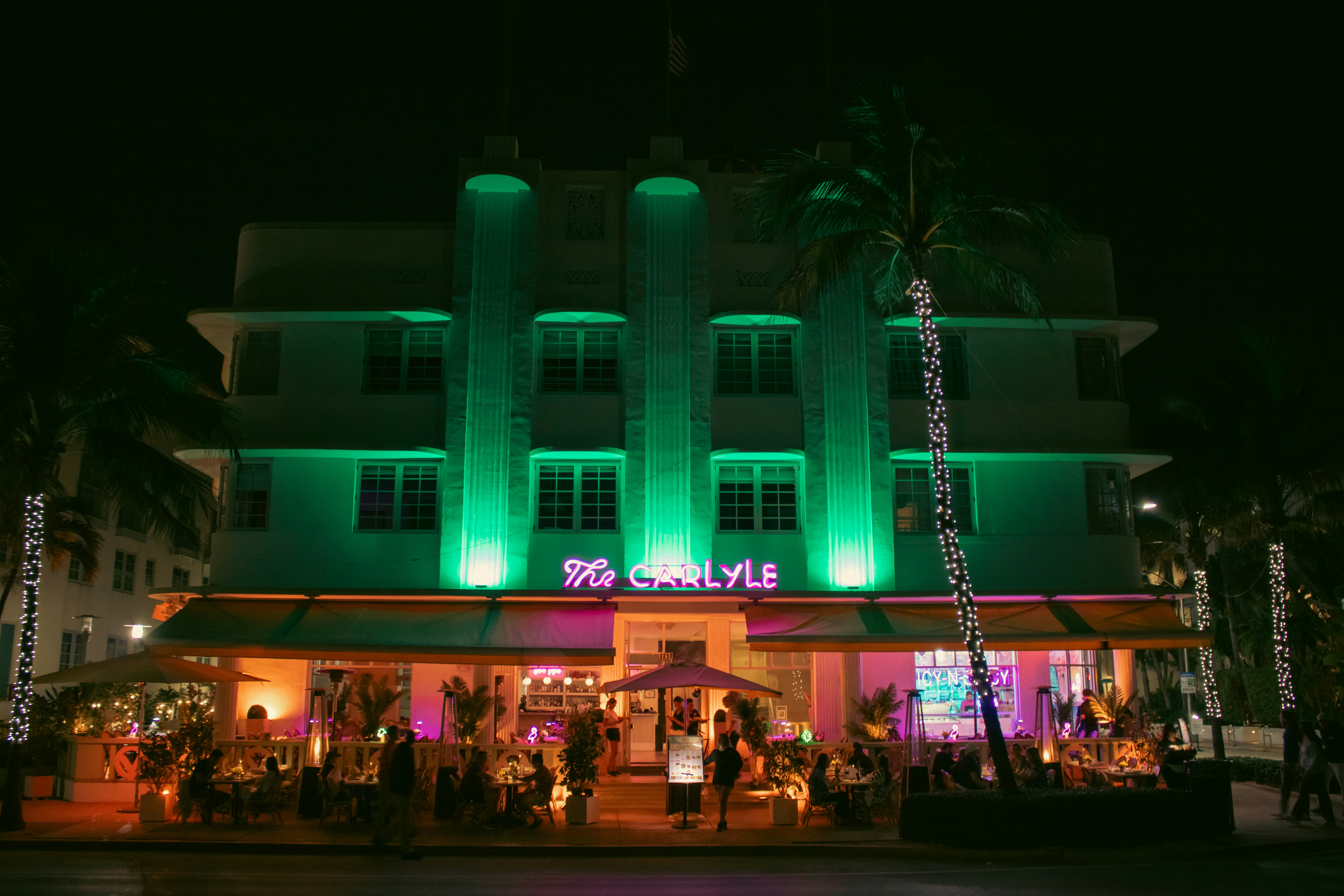 The Carlyle Hotel is a renowned Art Deco landmark located on Ocean Drive in the heart of Miami Beach’s Historic District. Built in 1941 and designed by architect Kiehnel and Elliott, the building is known for its symmetrical façade, pastel tones, vertical banding, and decorative glass-block windows. It has appeared in several films and is a quintessential example of South Beach’s preserved 20th-century architecture. The Carlyle remains a symbol of Miami’s cultural and architectural heritage, attracting tourists and design enthusiasts alike.