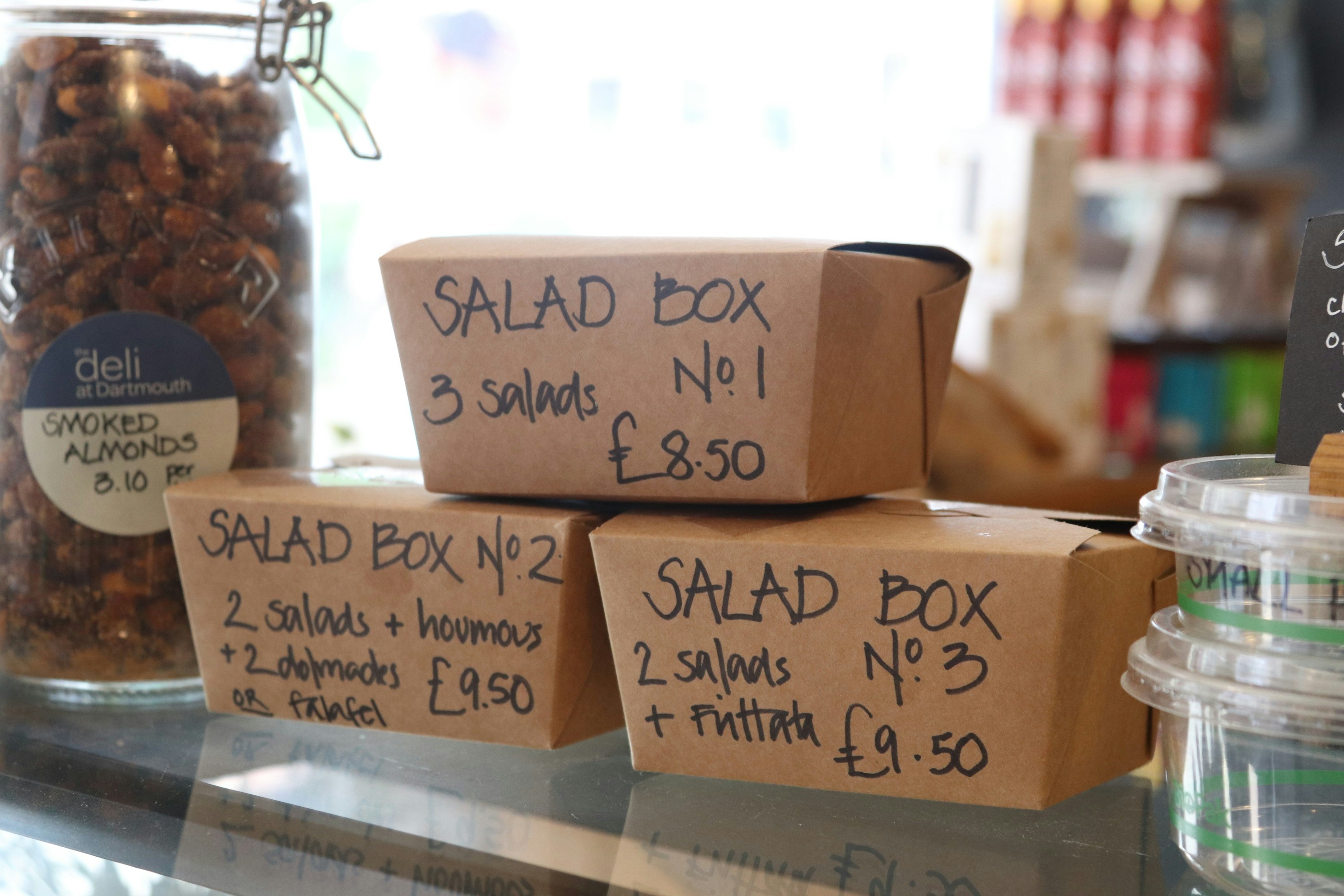 neatly arranged, individually labeled boxed lunches - business lunch delivery