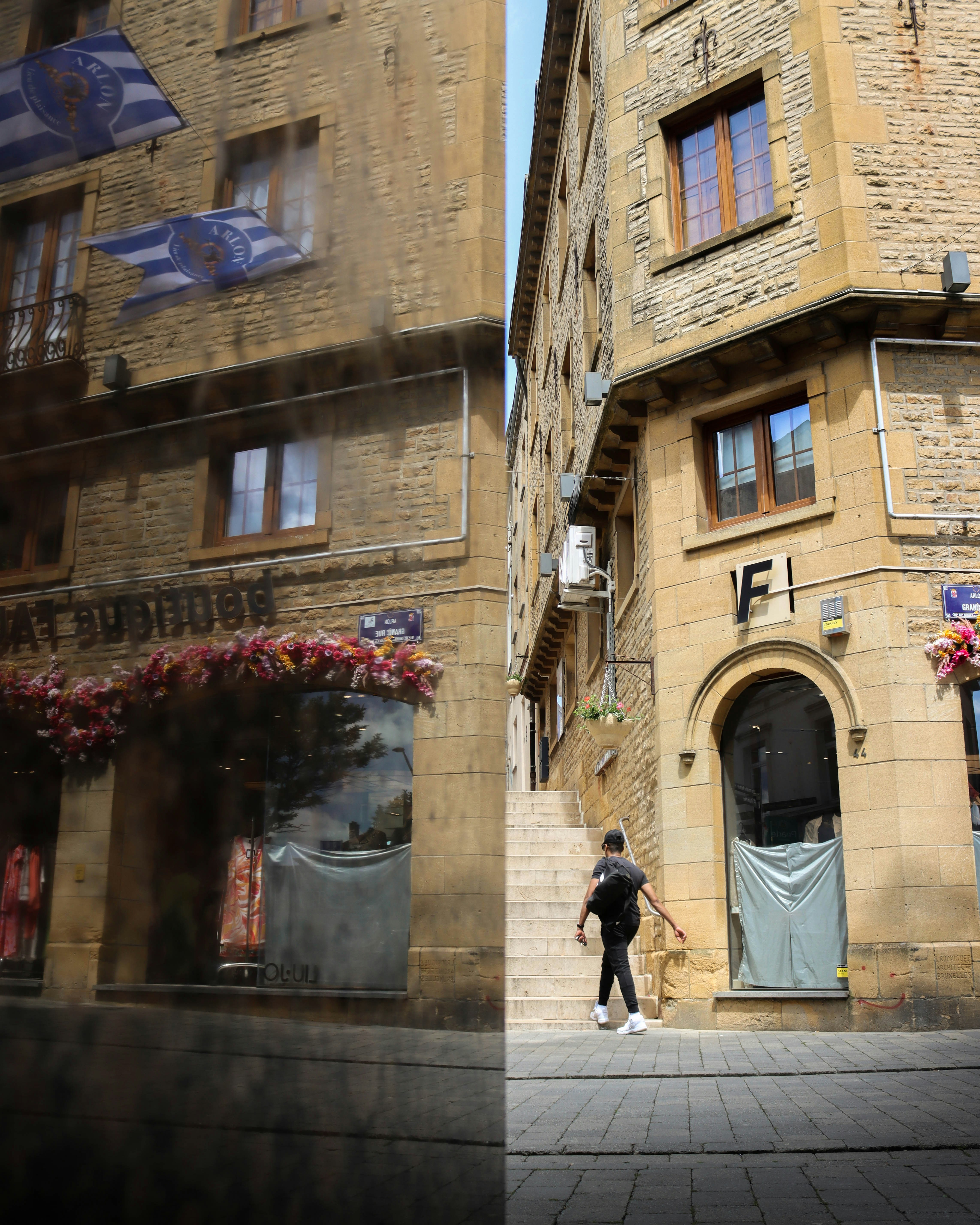 Street scene with architecture and a person walking.