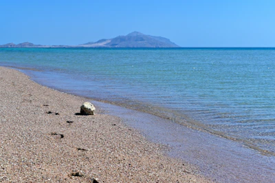 The Red Sea shore at Sharm el-Sheikh, with Tiran island on the horizon