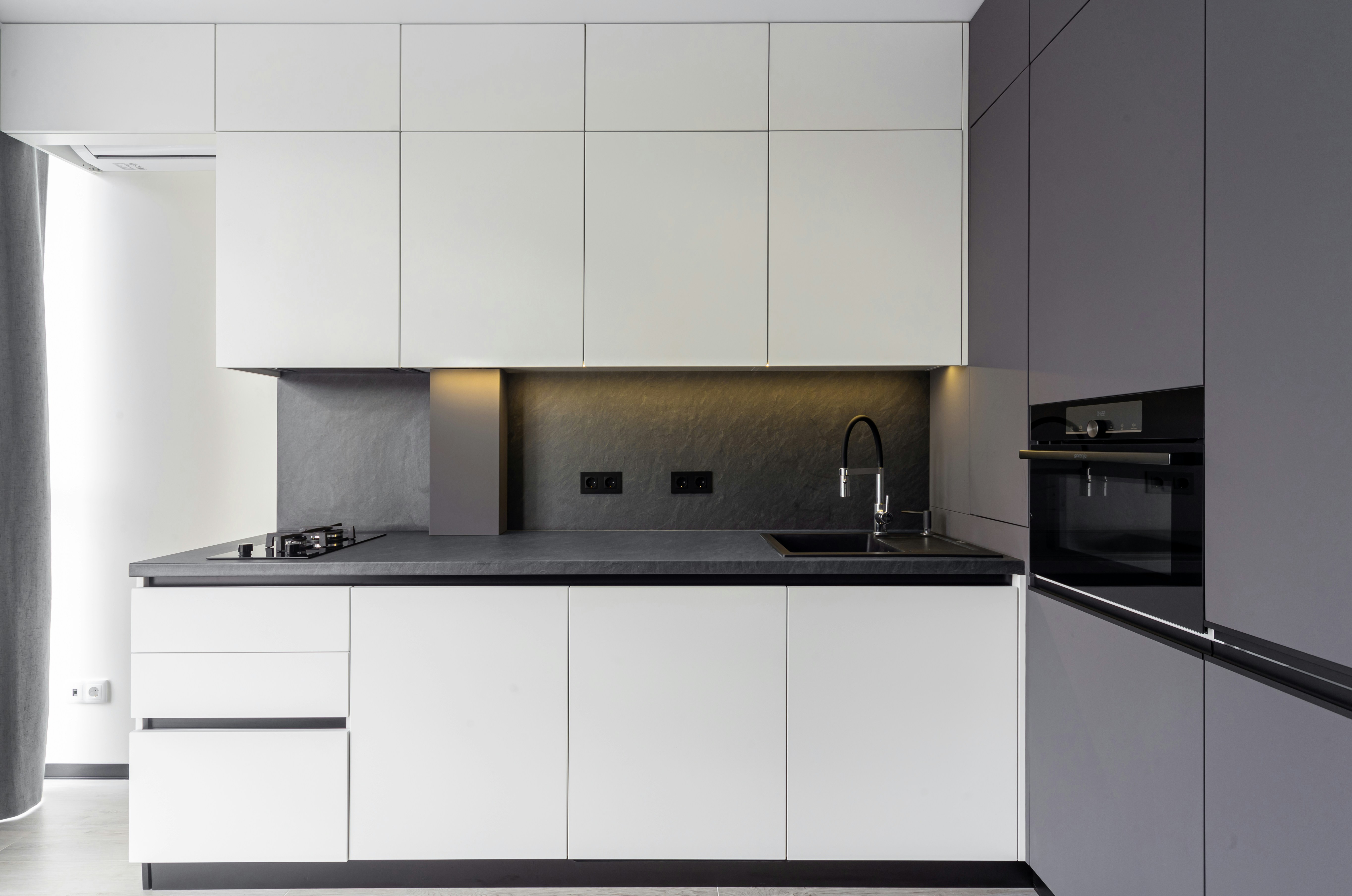 sleek, modern penthouse kitchen with high-end appliances - penthouse downtown chicago