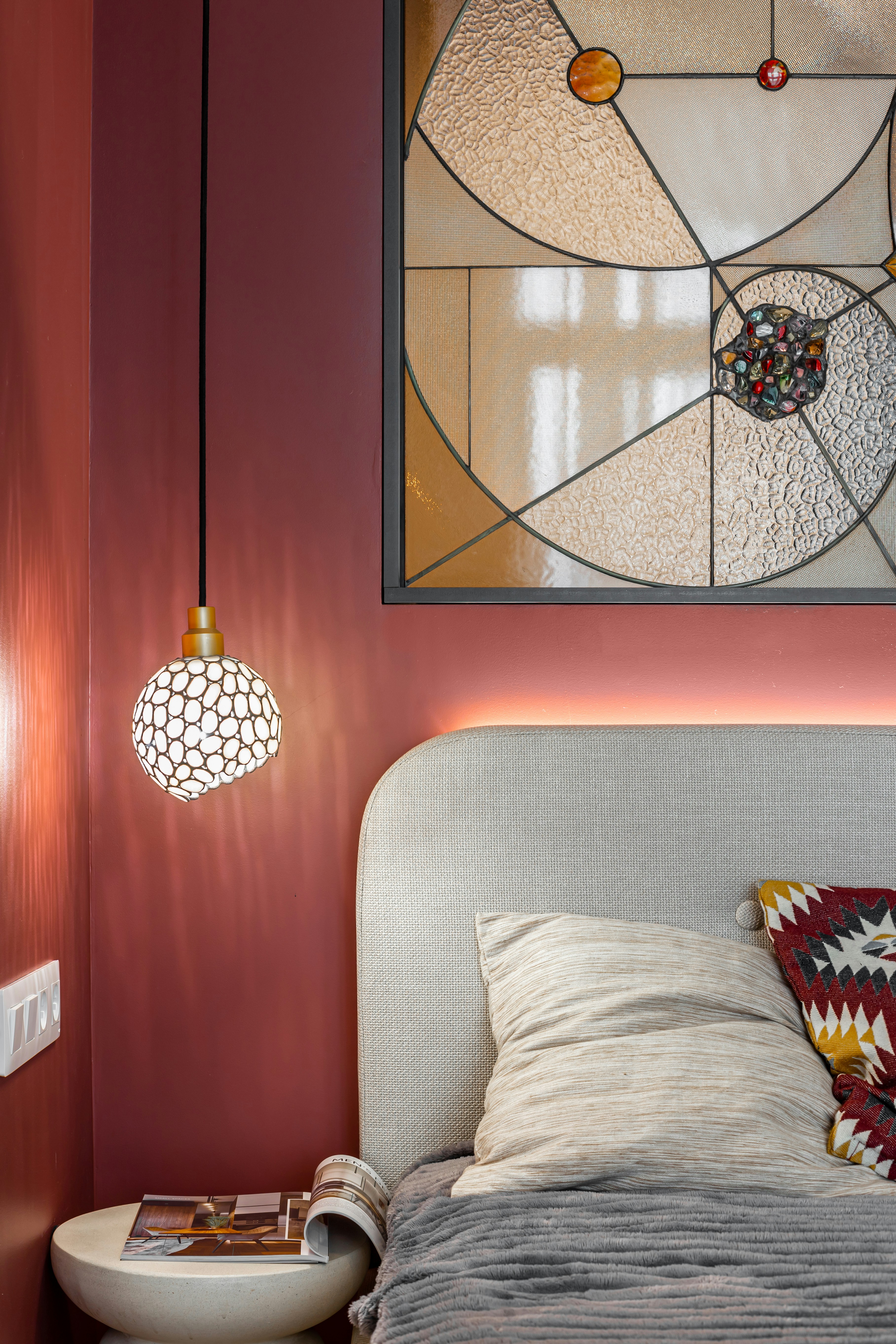 A cozy bedroom showcases modern design elements.