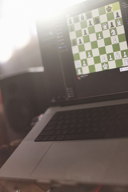 Chess position displayed on a laptop screen during an online game session