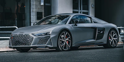 A silver audi r8 sports car.