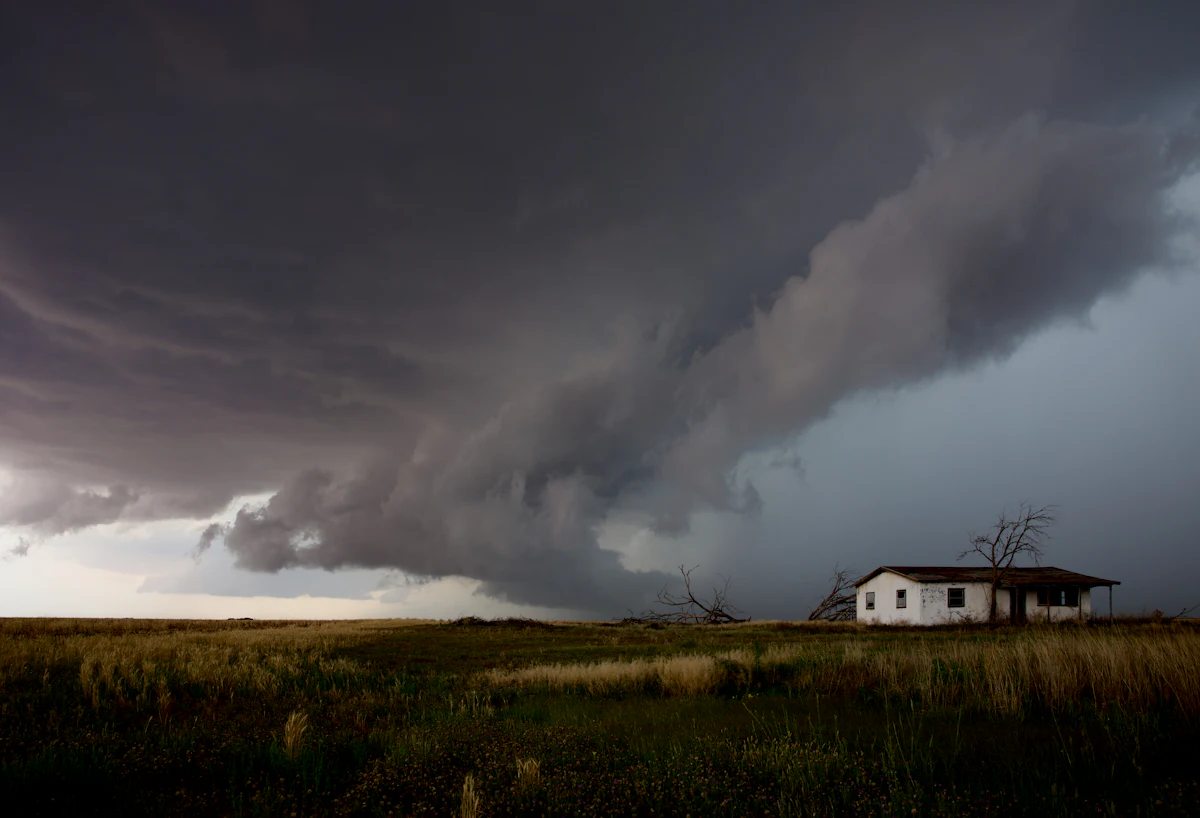 Storm clouds approaching a house