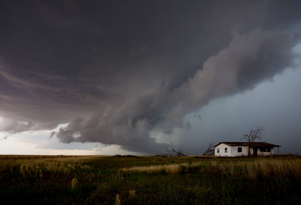 Dramatic storm clouds rolling over a wide-open Texas landscape