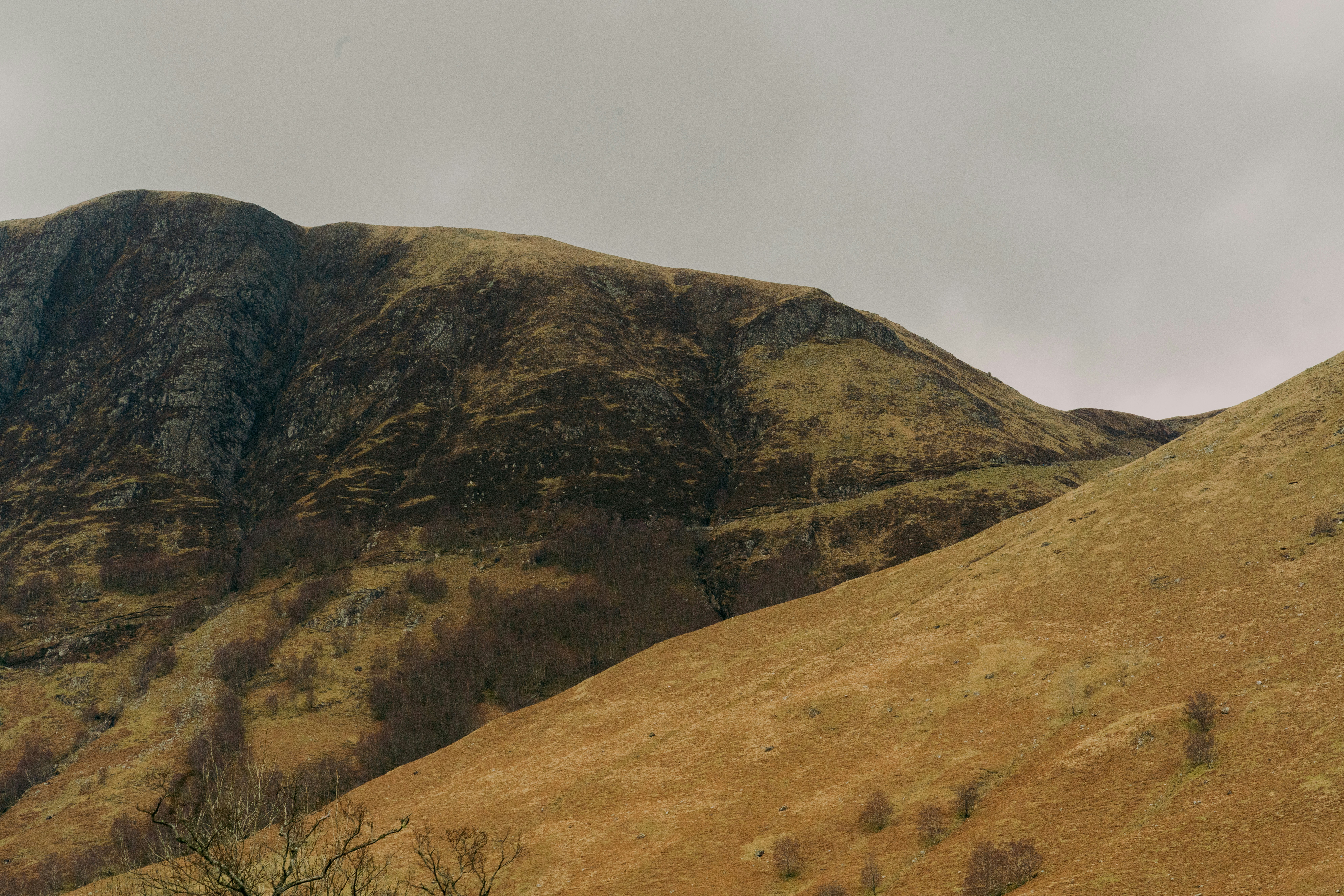 Mountainside landscape on a cloudy, overcast day.