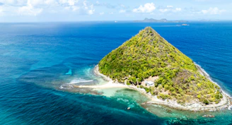 A beautiful, lush green island amidst blue waters.