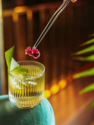 Asian-inspired cocktail with flower garnish