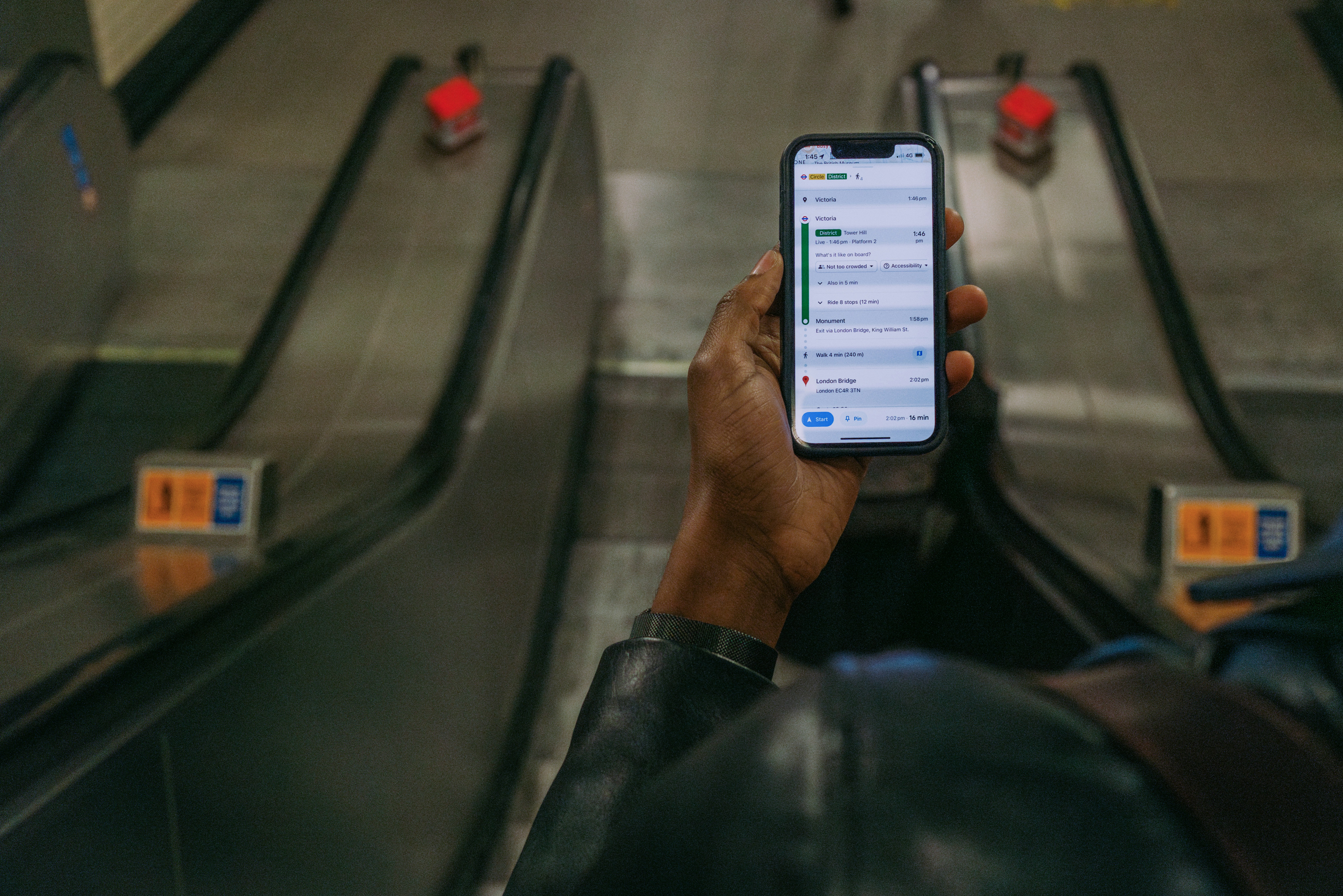 Person using an app to book airport transportation on a smartphone