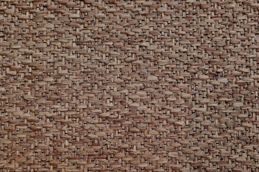 Close-up of a handwoven wool area rug texture