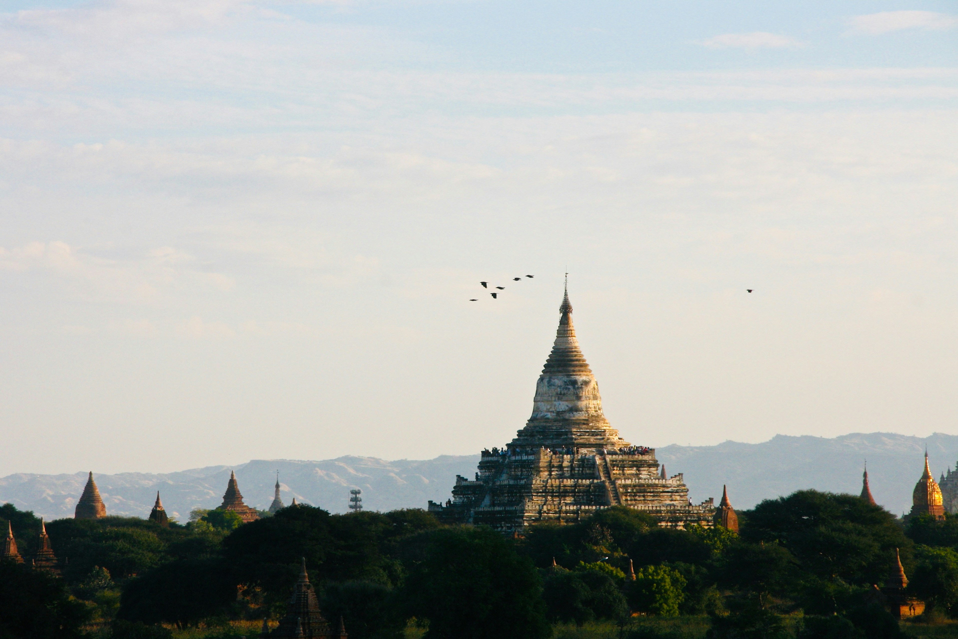 A beautiful buddhist temple in a scenic landscape.