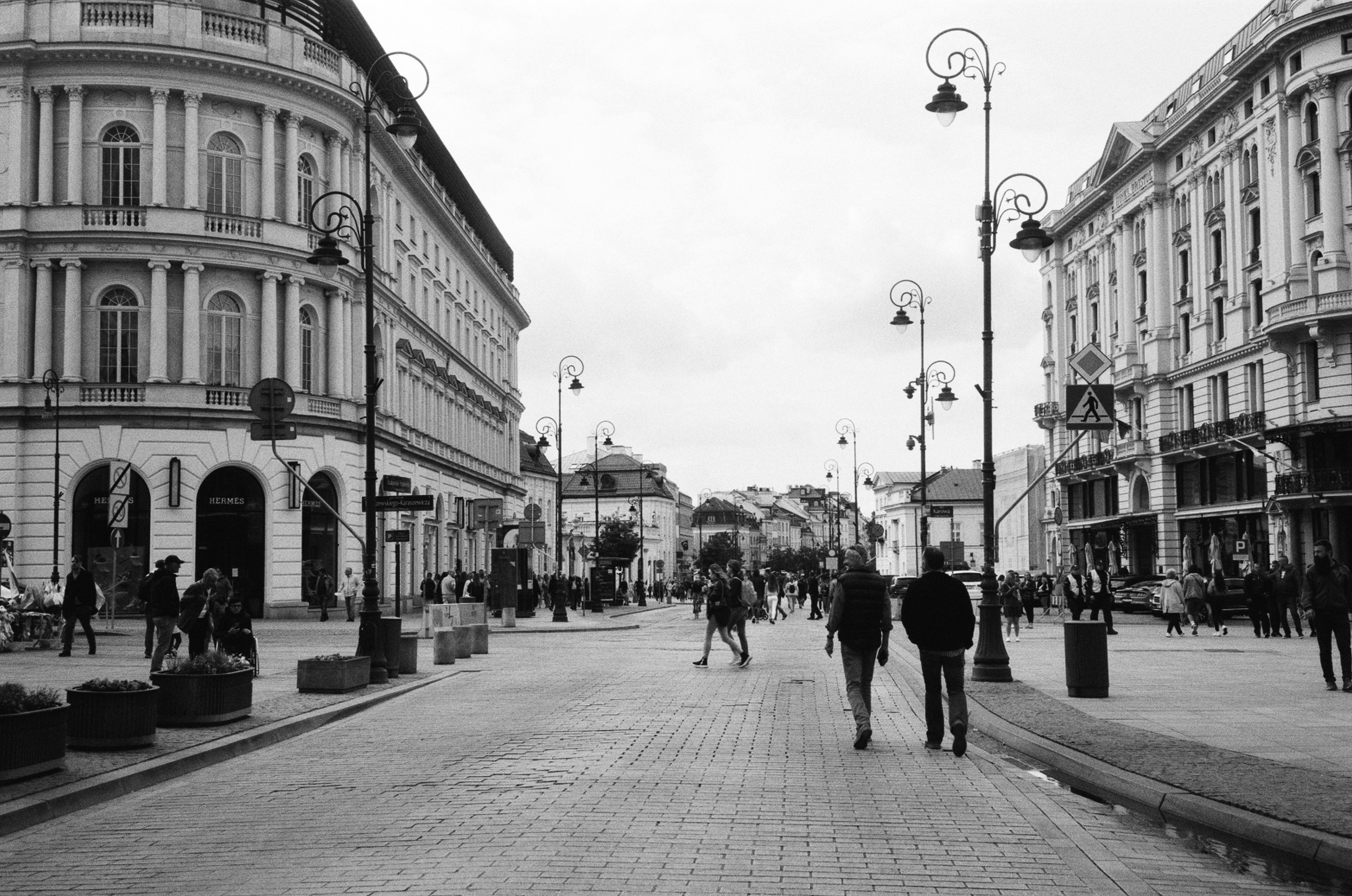Stop image for Bozeman & Gallatin National Forest: 2-Day Family Nature Loop - A pedestrian street with ornate buildings and people. -  in Rocky Mountains & Northern Rockies - Photo by Bruce Barrow on Unsplash