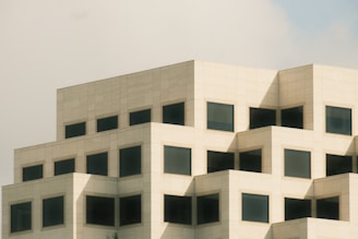 Modern architecture with boxy, angular structure.