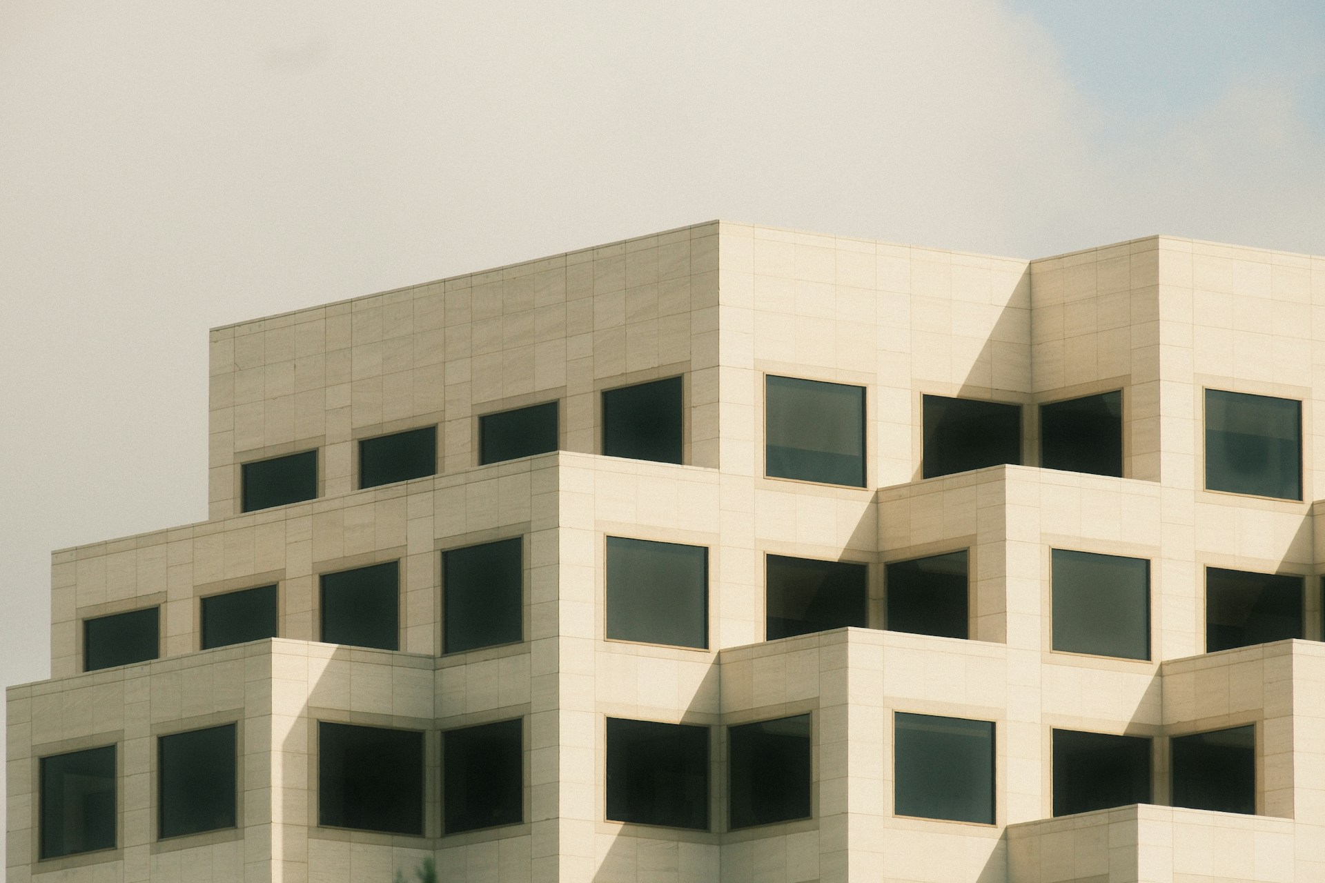 Modern architecture with boxy, angular structure.