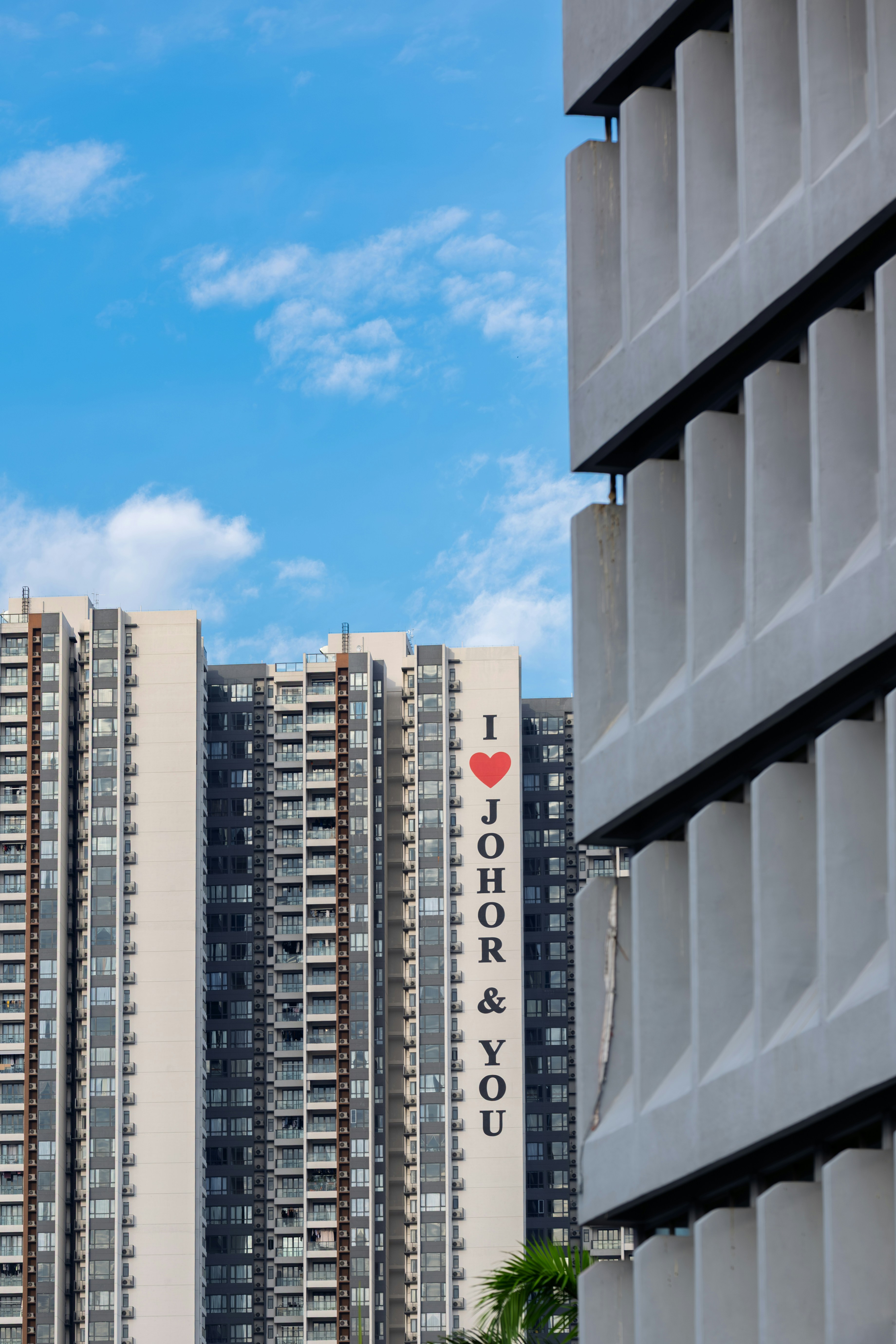 A building displays "i love johor & you."