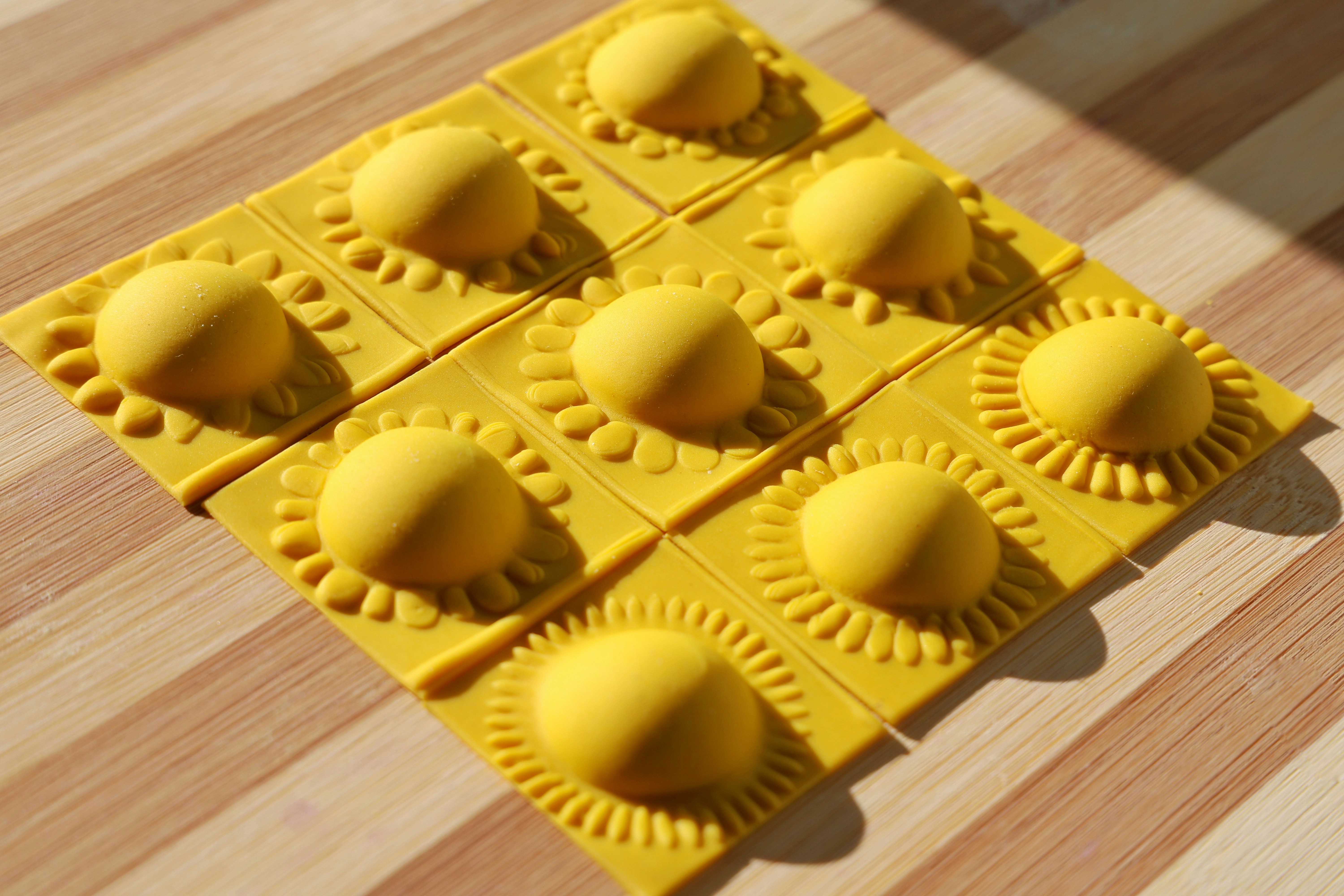 Handmade wooden ravioli molds