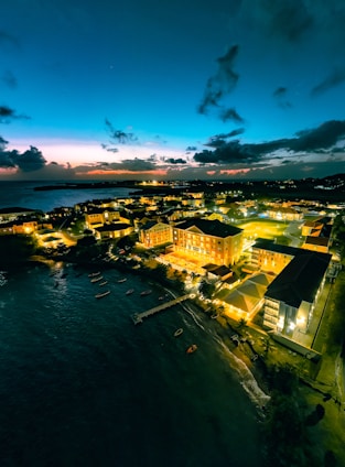 Evening view of a coastal city at dusk.