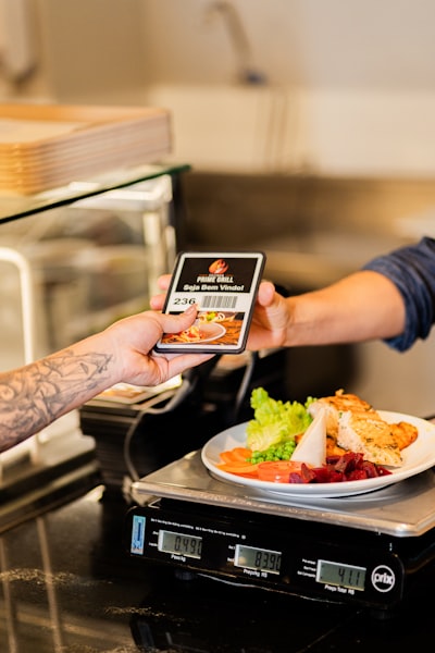 Customer paying for online food order using smartphone