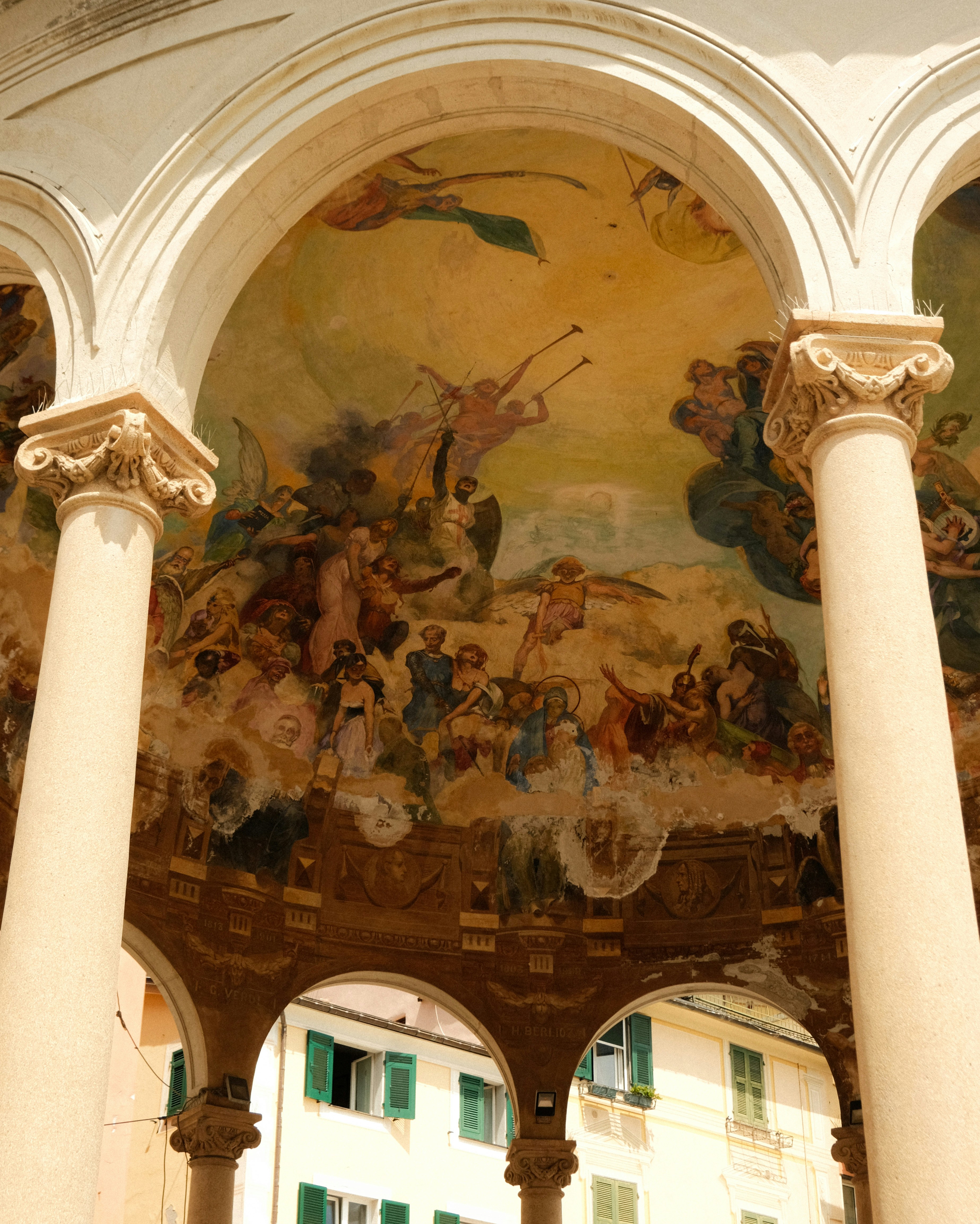 Archway displays a vibrant fresco painting.