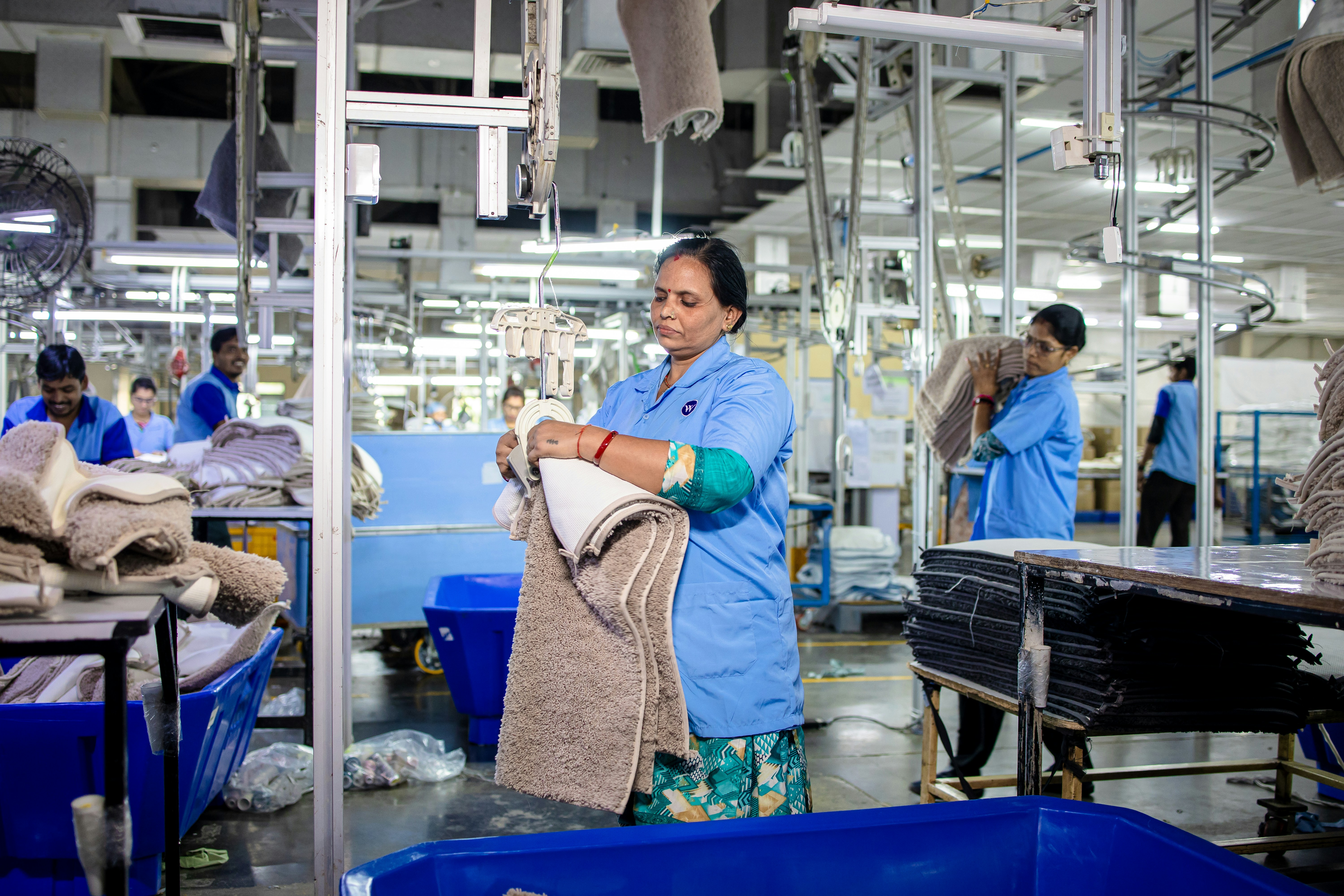 Workers are busy in a textile factory.