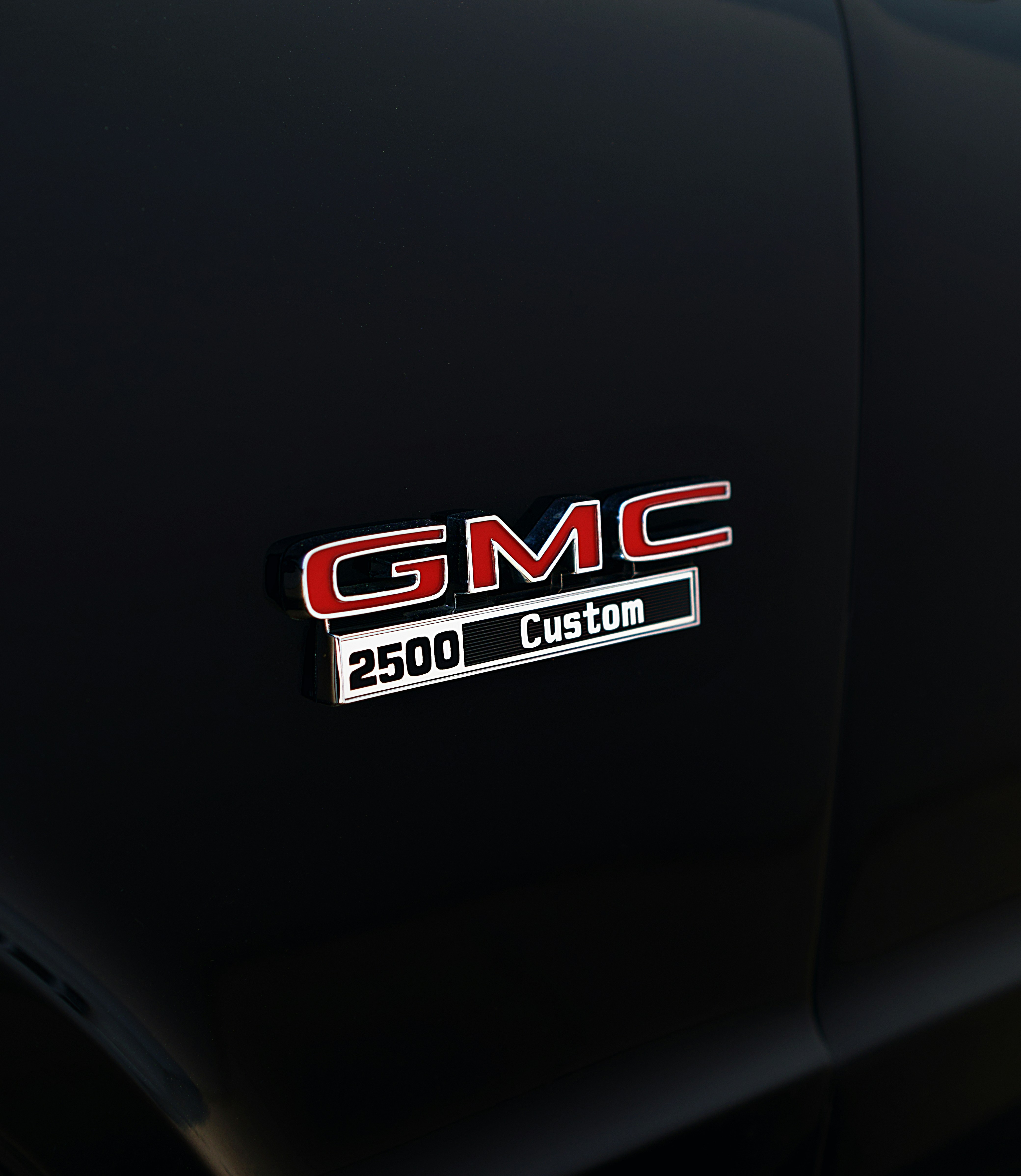 Black GMC 2500 Custom oldies classic car.