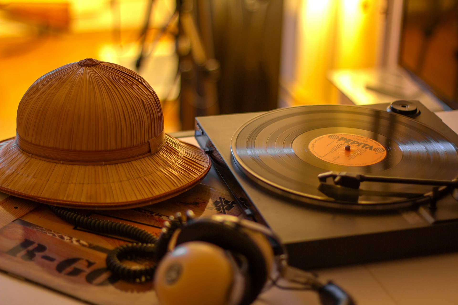 A record player and safari hat.