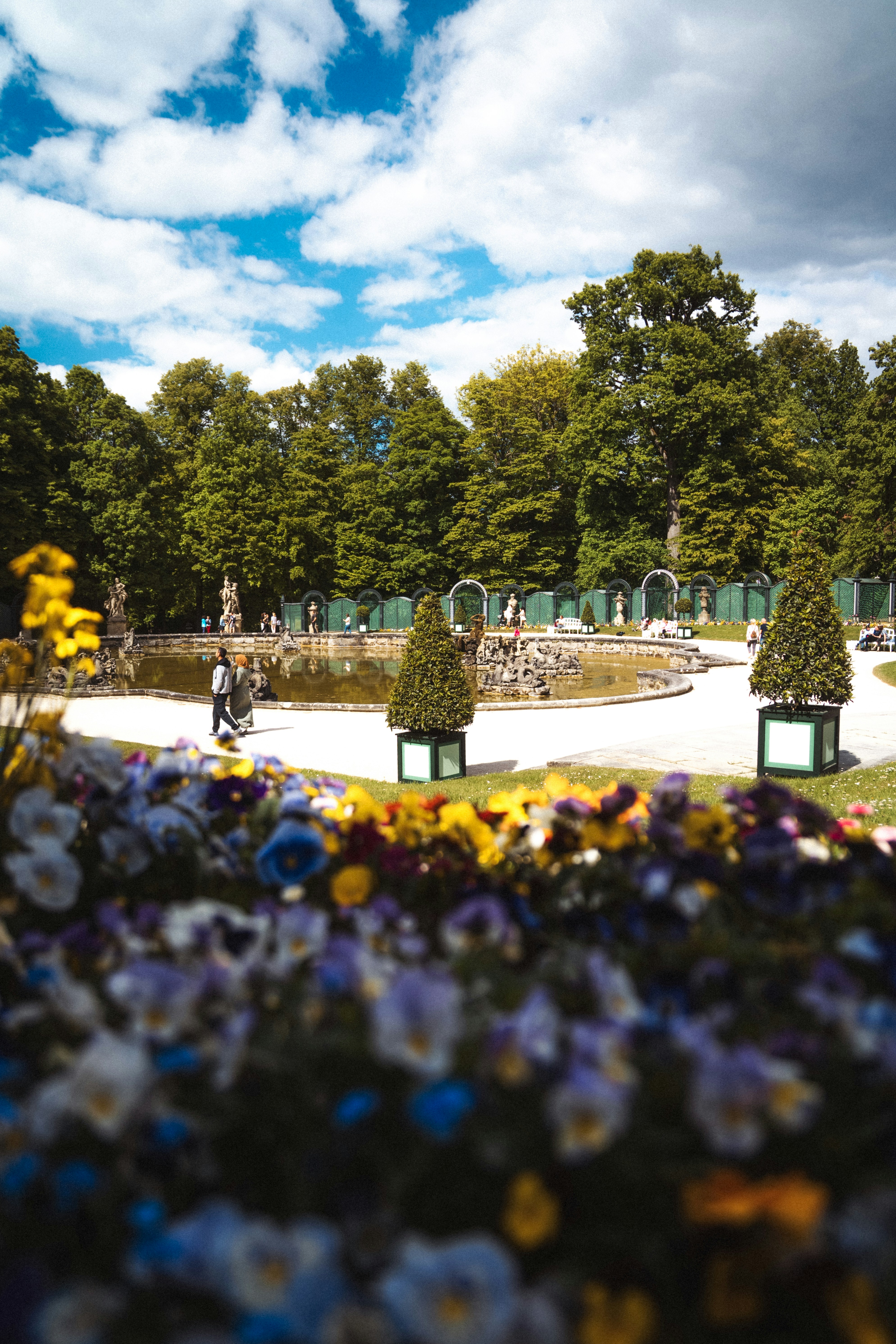A beautiful park with flowers and trees