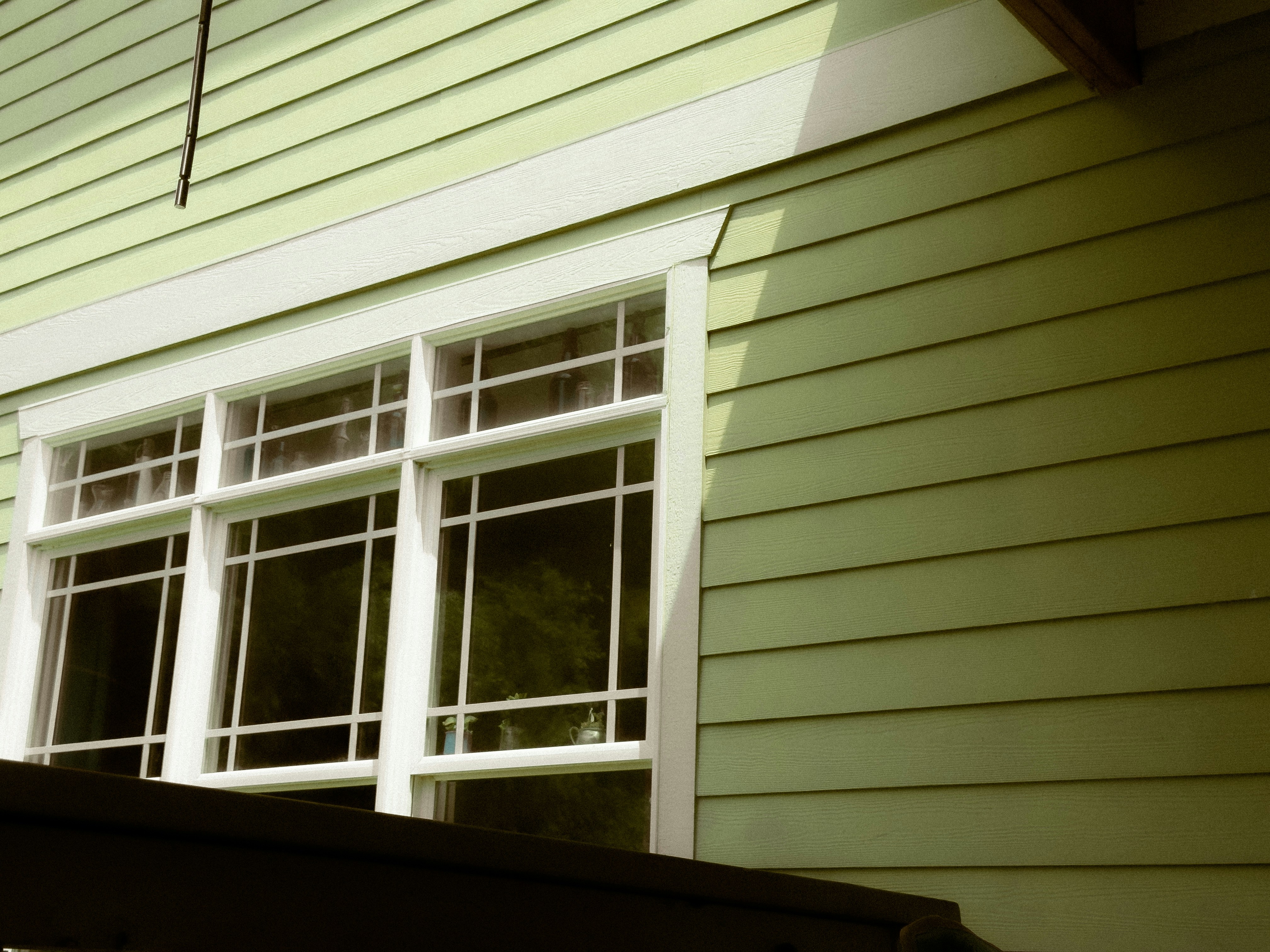 home with new vinyl siding and energy-efficient windows - exterior remodeling Columbia