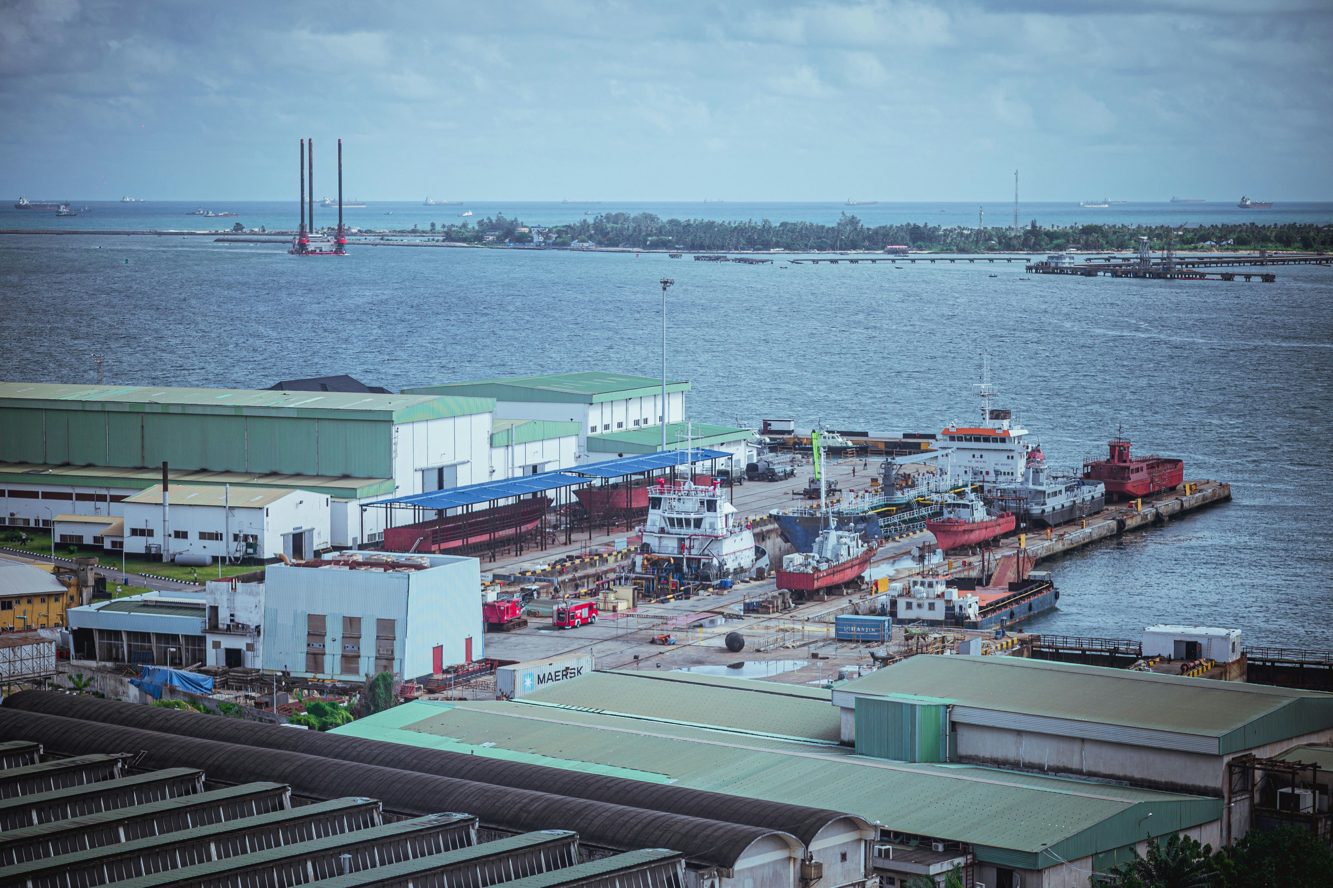 A busy port is filled with several ships.
