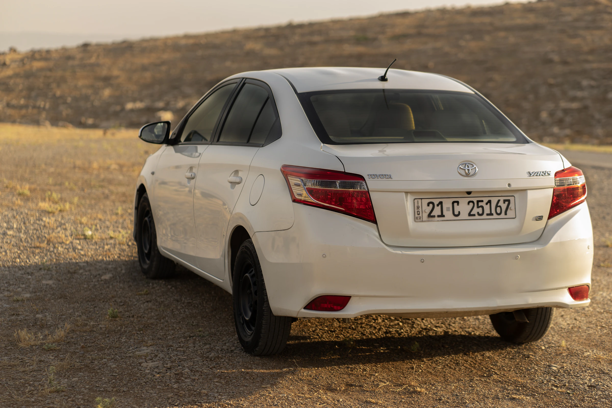 Ride Vihar cab waiting on an open road at golden hour