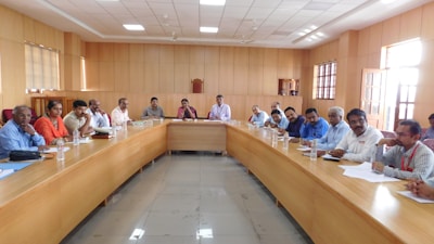 A group of men are having a meeting.