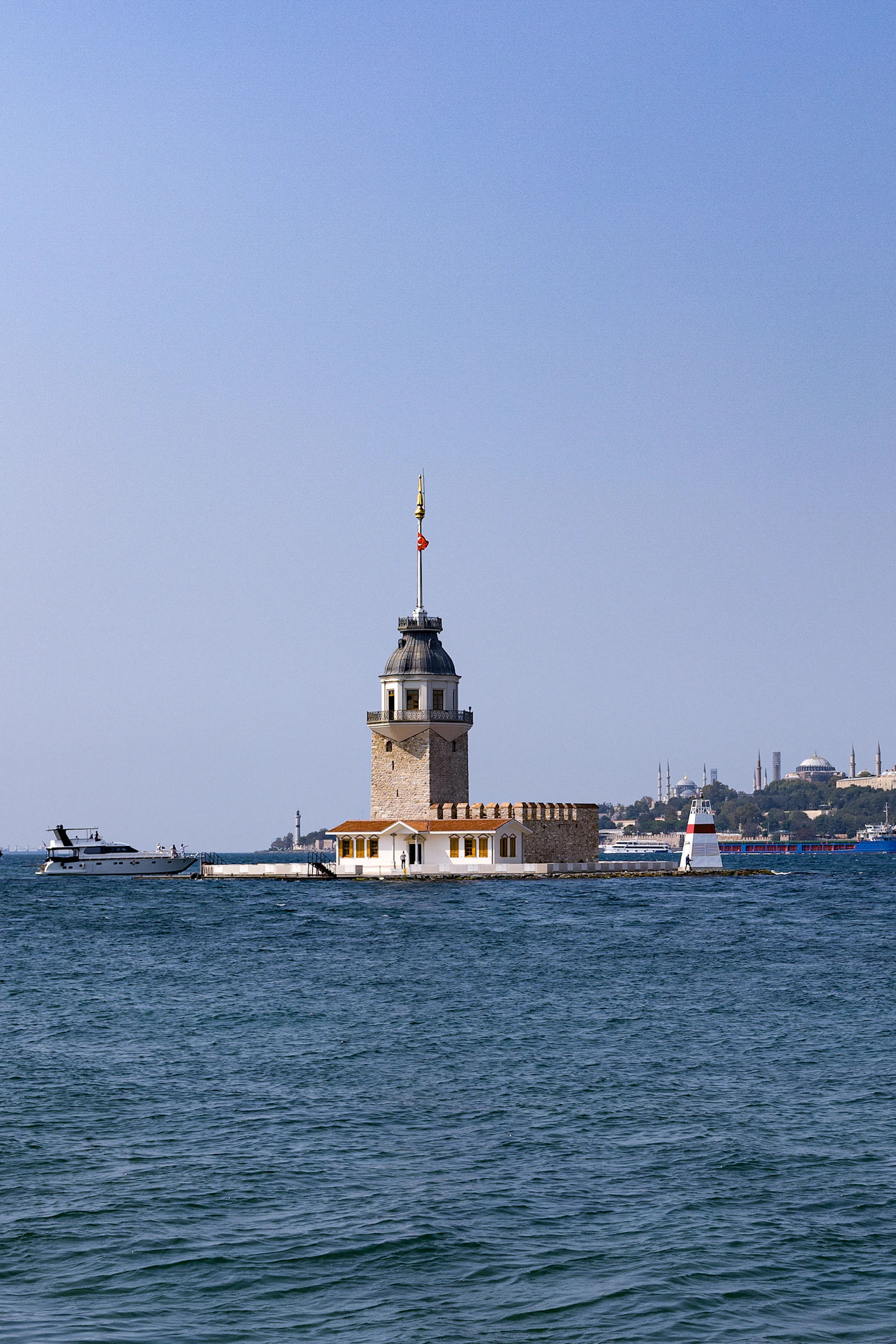 Maiden's Tower standing in turquoise Bosphorus water, Istanbul, Turkey