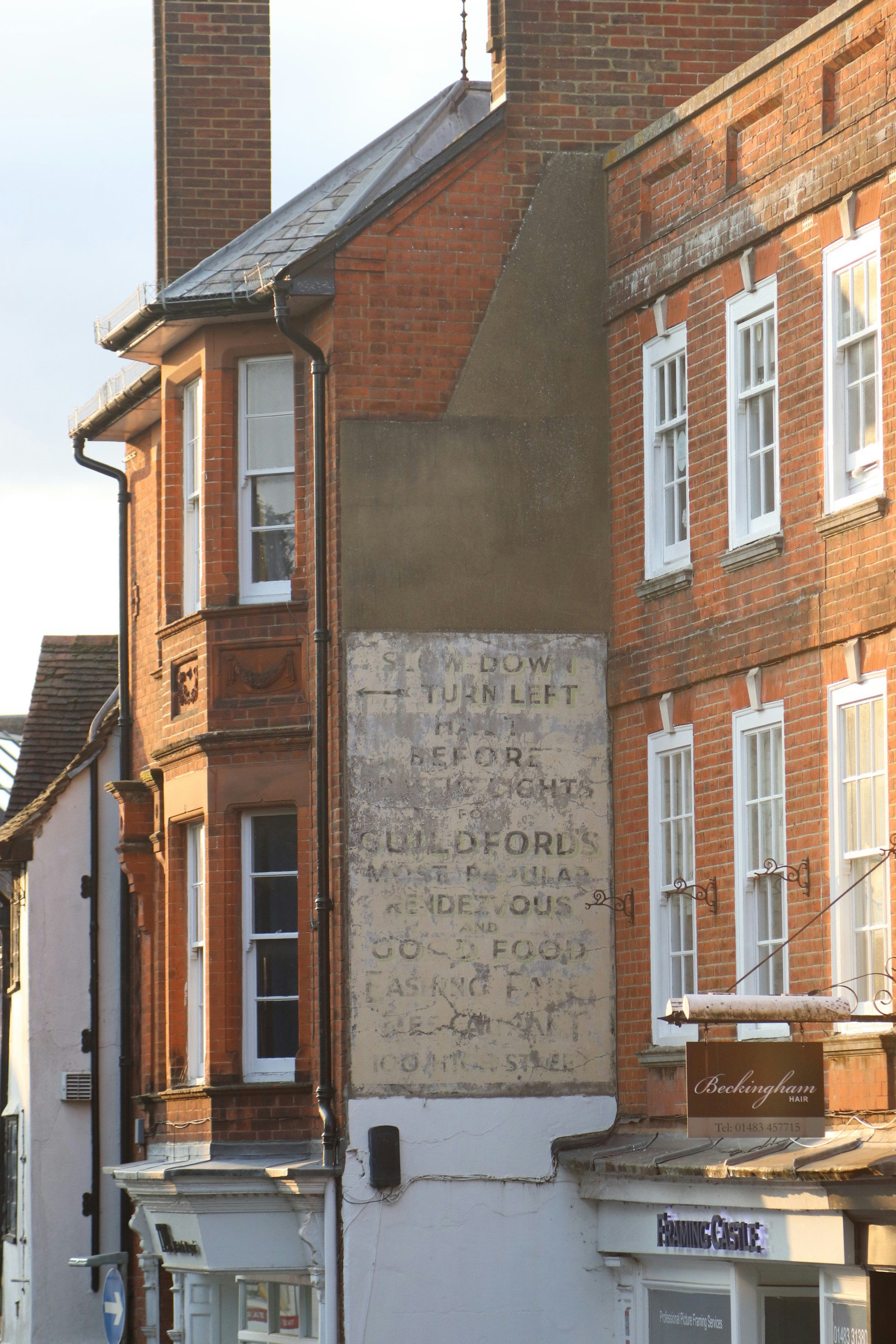 An old sign on a building.