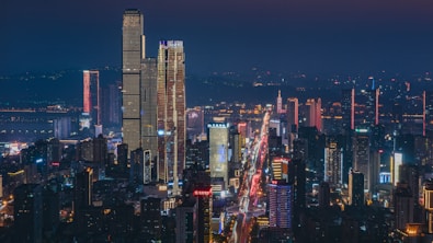 City skyline illuminated at night.