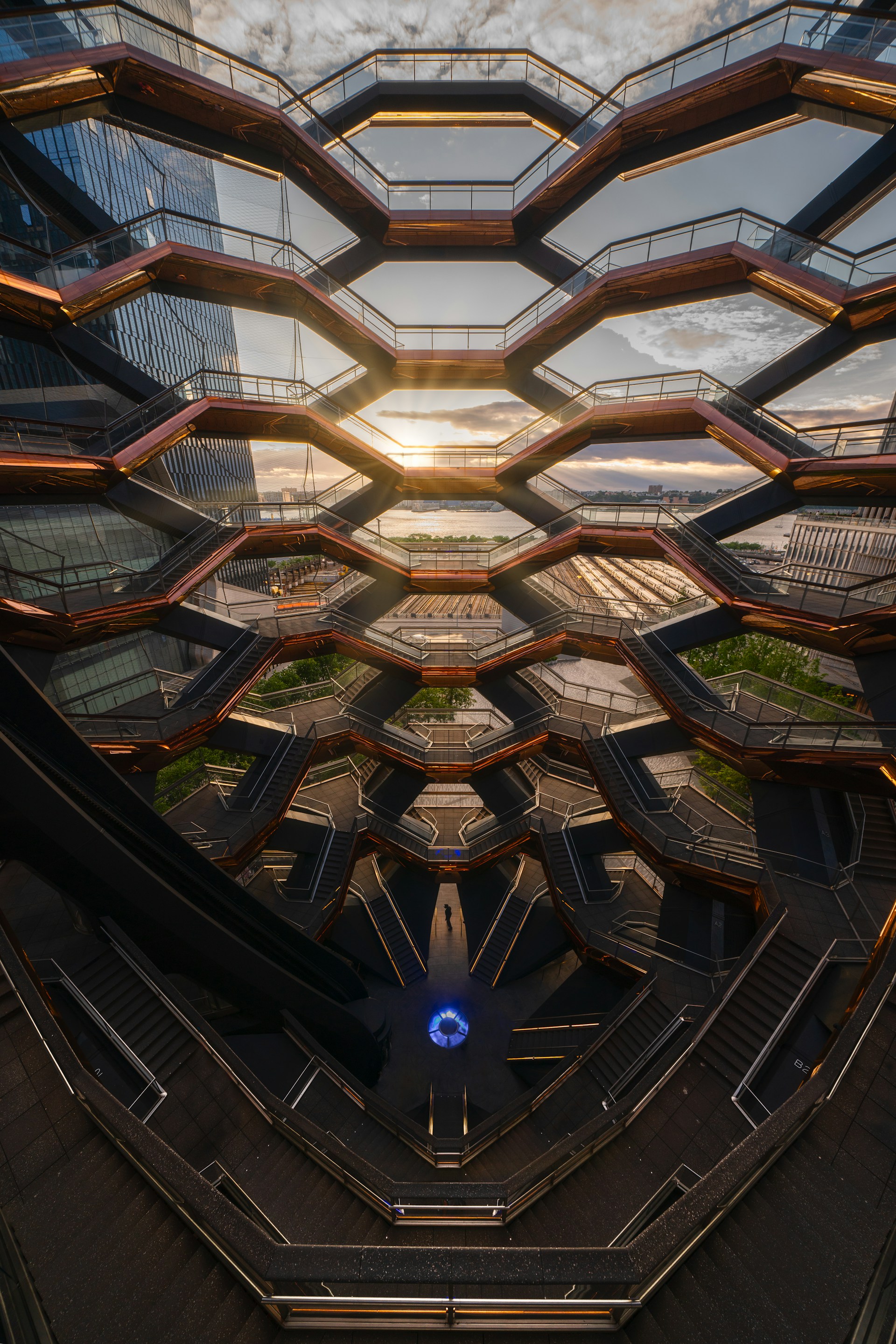 The vessel building's intricate honeycomb design is shown.