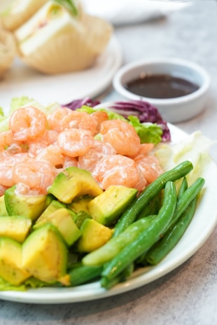 Shrimp salad with avocado and green beans.