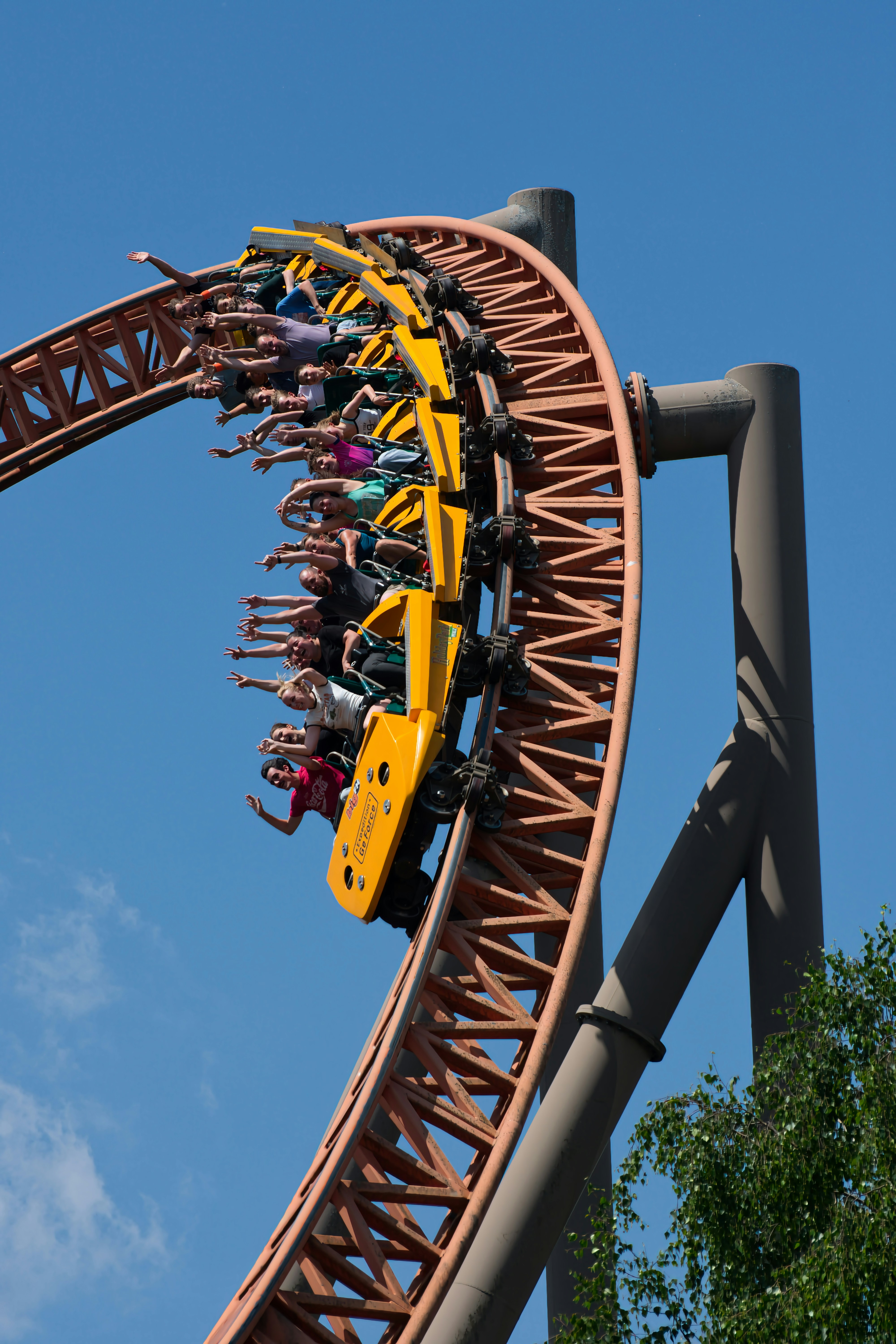 People enjoy a thrilling ride on a roller coaster.