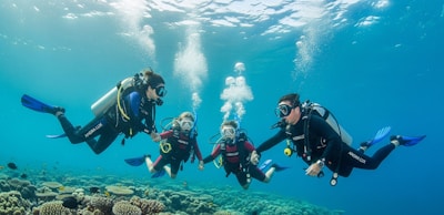 Scuba divers explore the ocean together.