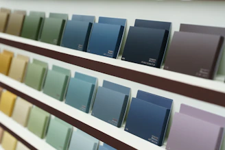 Paint color swatches are displayed on a shelf.