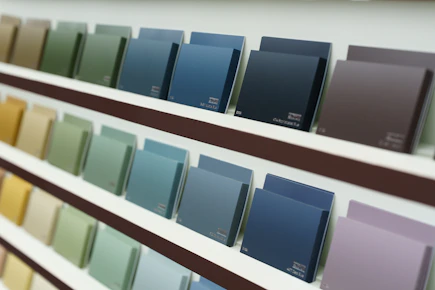 Paint color swatches are displayed on a shelf.