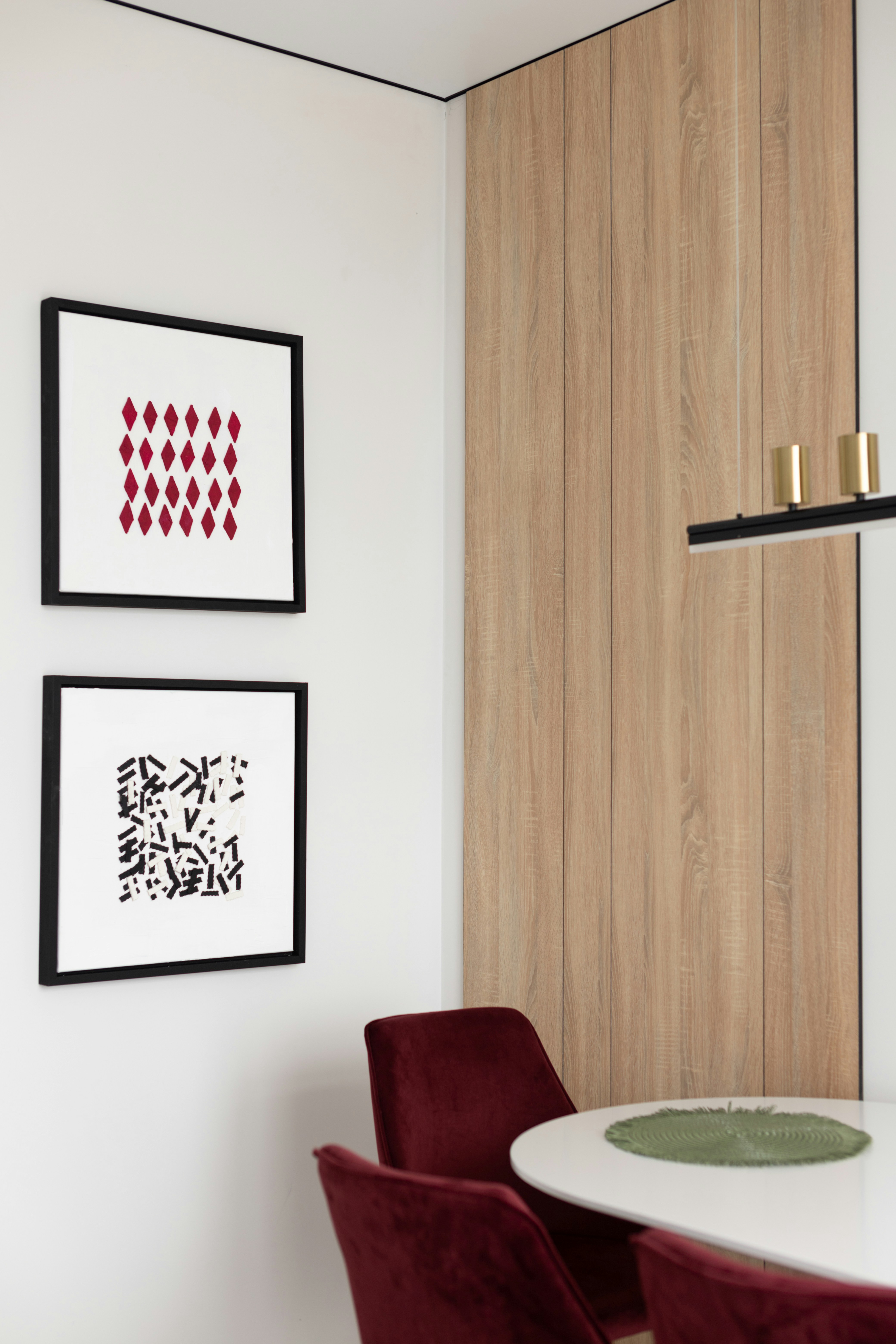 Modern interior design with art and a table.