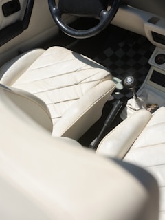 Interior view of a classic convertible car.