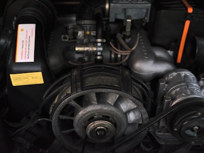 A car engine with a cooling fan.