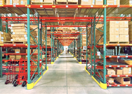 A warehouse is filled with shelves and boxes.