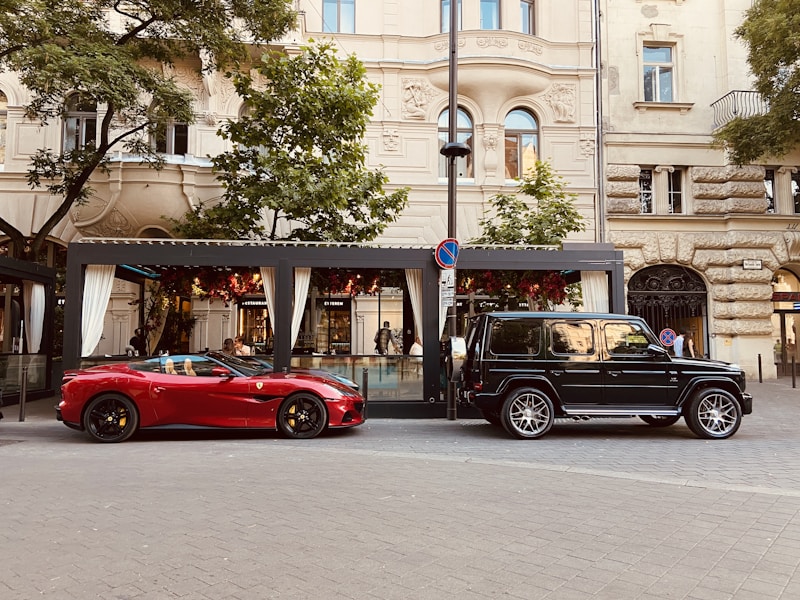 Luxury cars by cafe