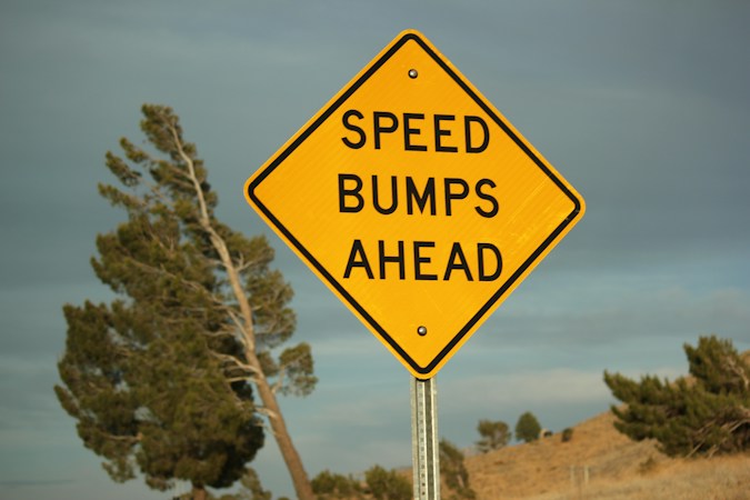 A yellow warning sign telling drivers speed bumps are ahead, similar to signs that will mark new speed cushions on Las Vegas city streets
