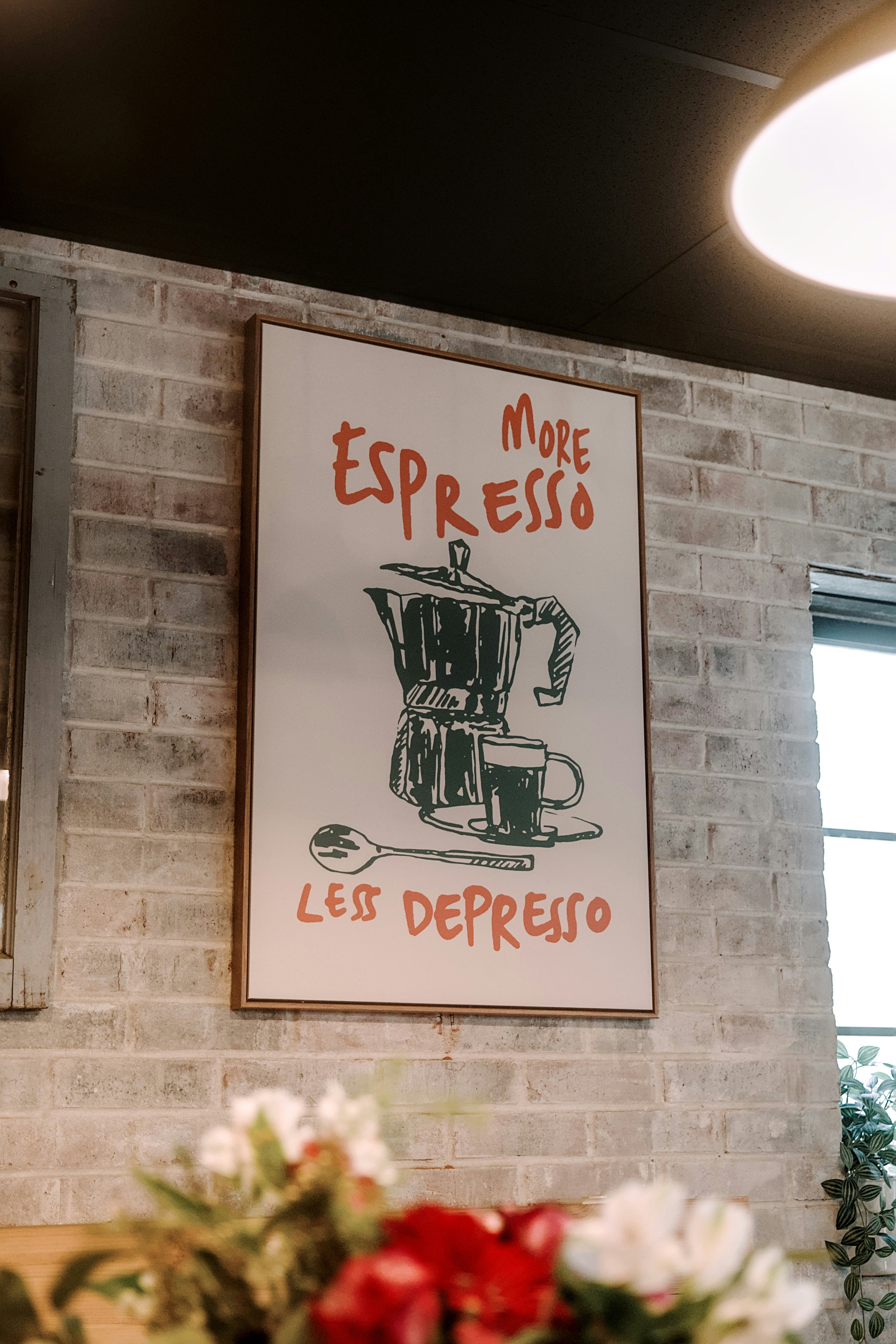 A humorous sign about espresso and depression.