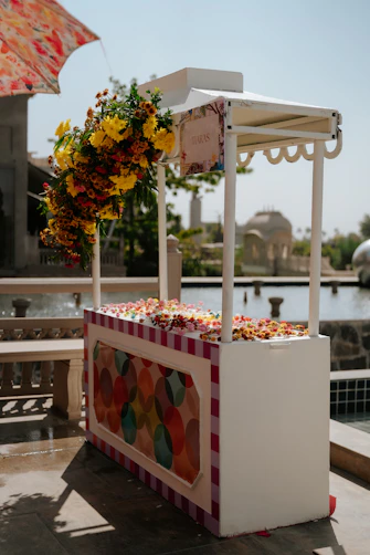 A beautifully decorated treat stand is ready for guests.
