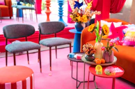 Vibrant and colorful interior with furniture and flowers.